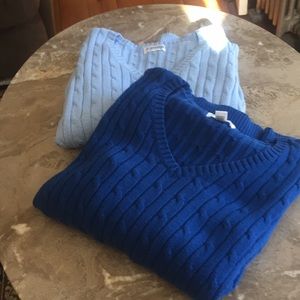 2 sweaters, v-neck. Gently worn.